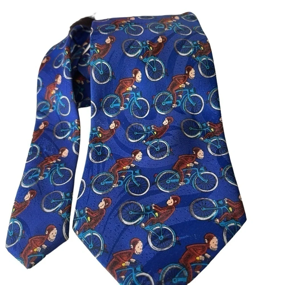 Curious George men’s tie 100% Polyester George on a bicycle Novelty Tie blue